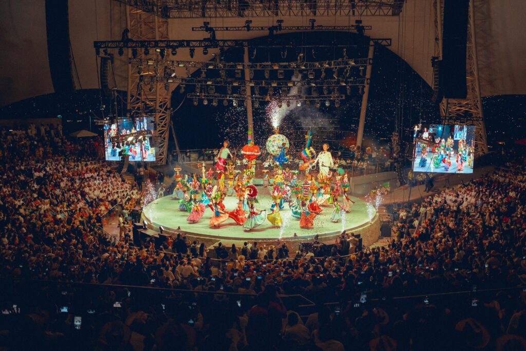 Services Lively celebration of traditional dance at the Guelaguetza festival in Oaxaca, Mexico, with colorful costumes.